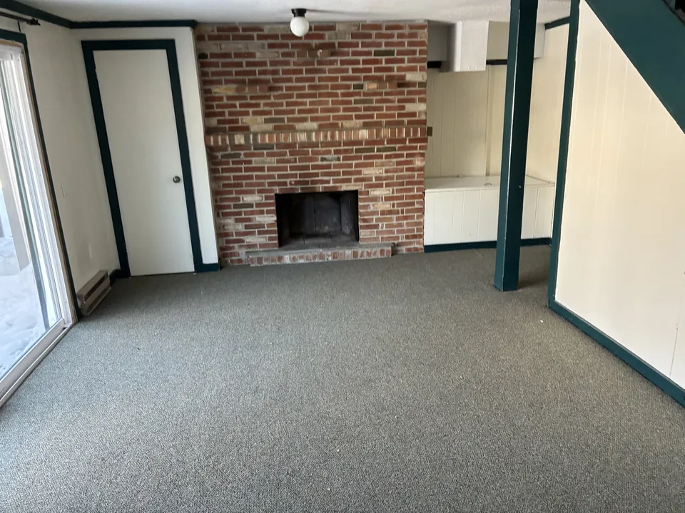 The same room empty after a TJ's cleanout