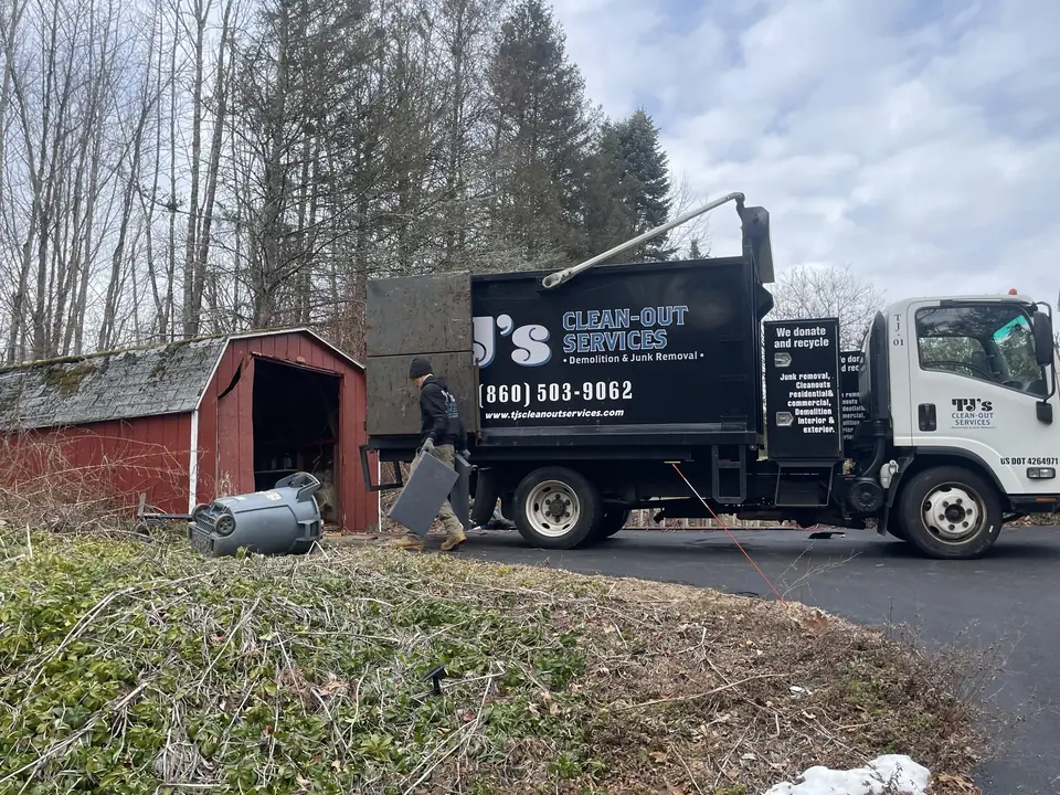 TJ's truck at a shed removal job